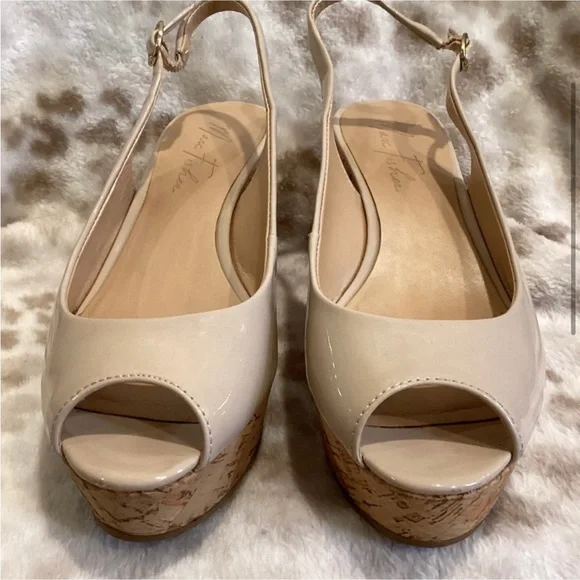 Marc Fisher Nude Patent Leather Peep Toe Wedge
Sandal, Size 8 - Picture 3 of 10